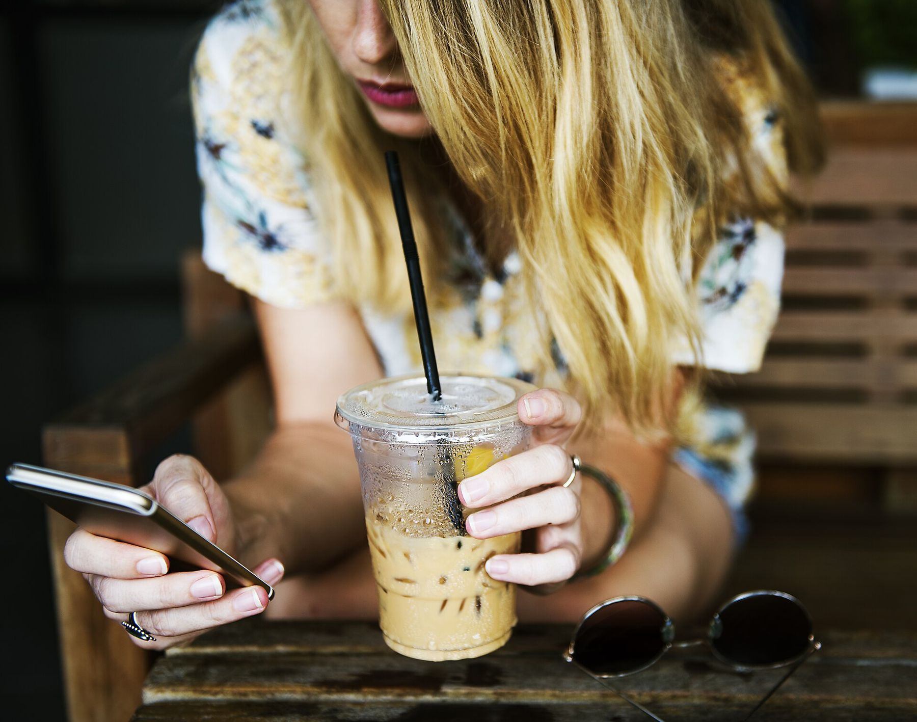 Texting over an iced coffee