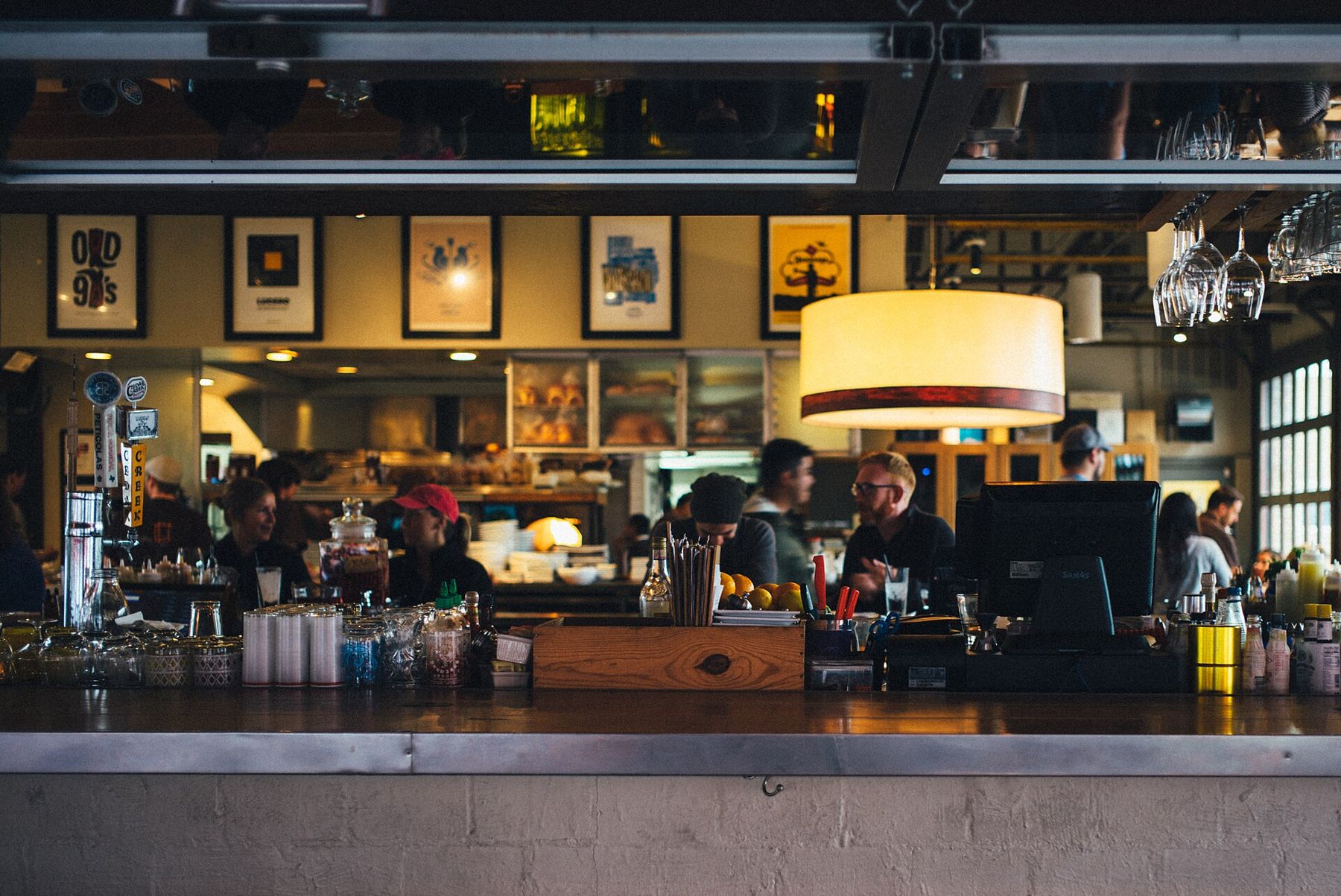 Behind the bar of a busy café